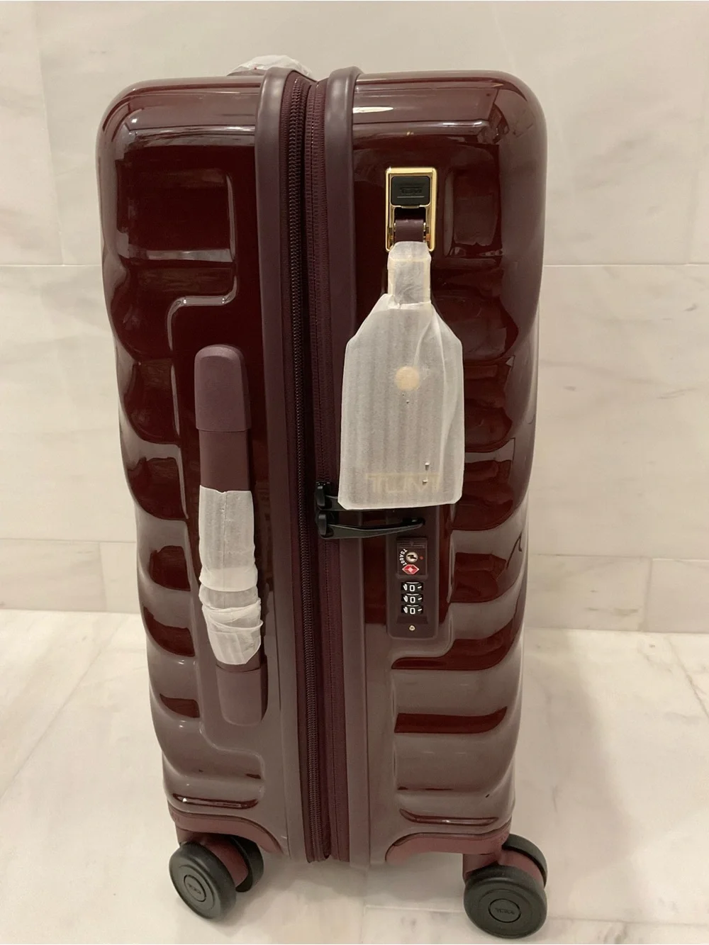 Tumi up sale